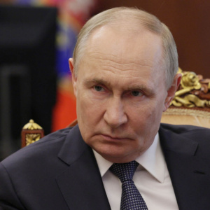 путін