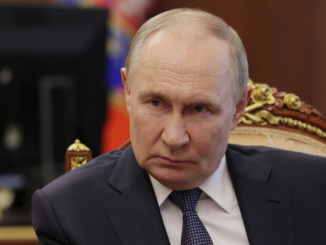 путін