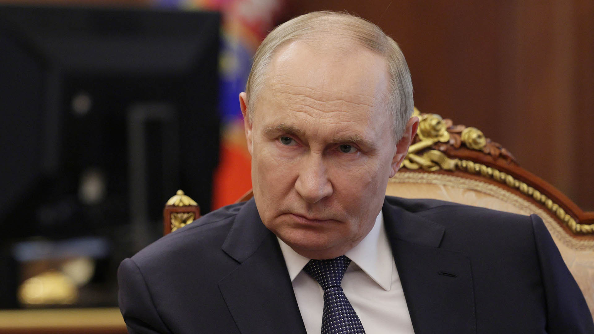 путін